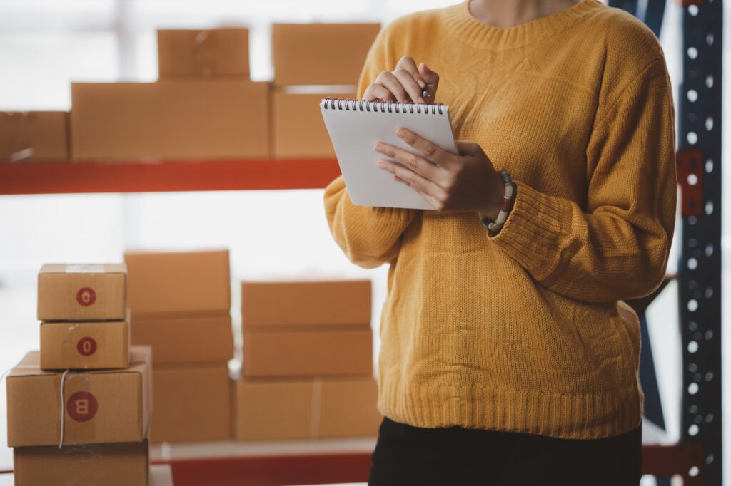 The owner of an online store is checking orders.